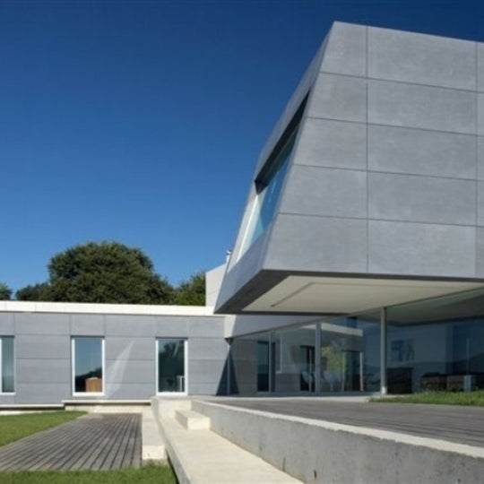 FACHADA DE PORCELANATO EFECTO PIEDRA - ARQMAT